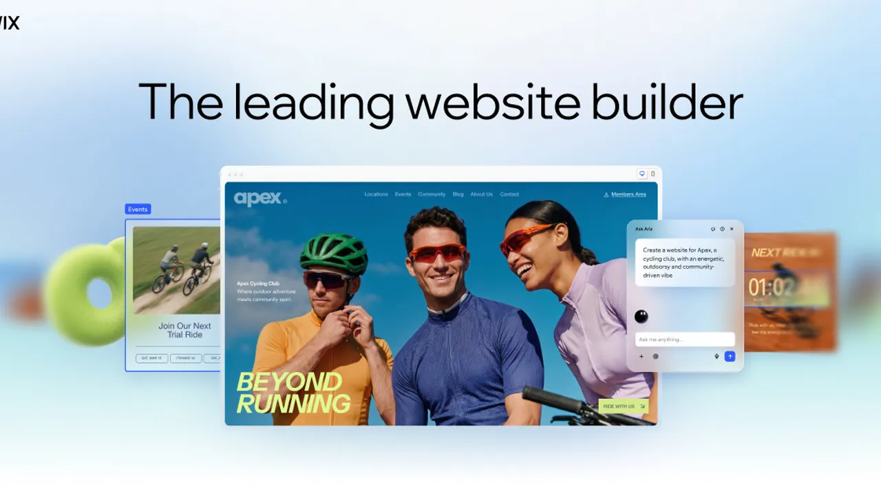 A website builder workspace with a laptop and phone