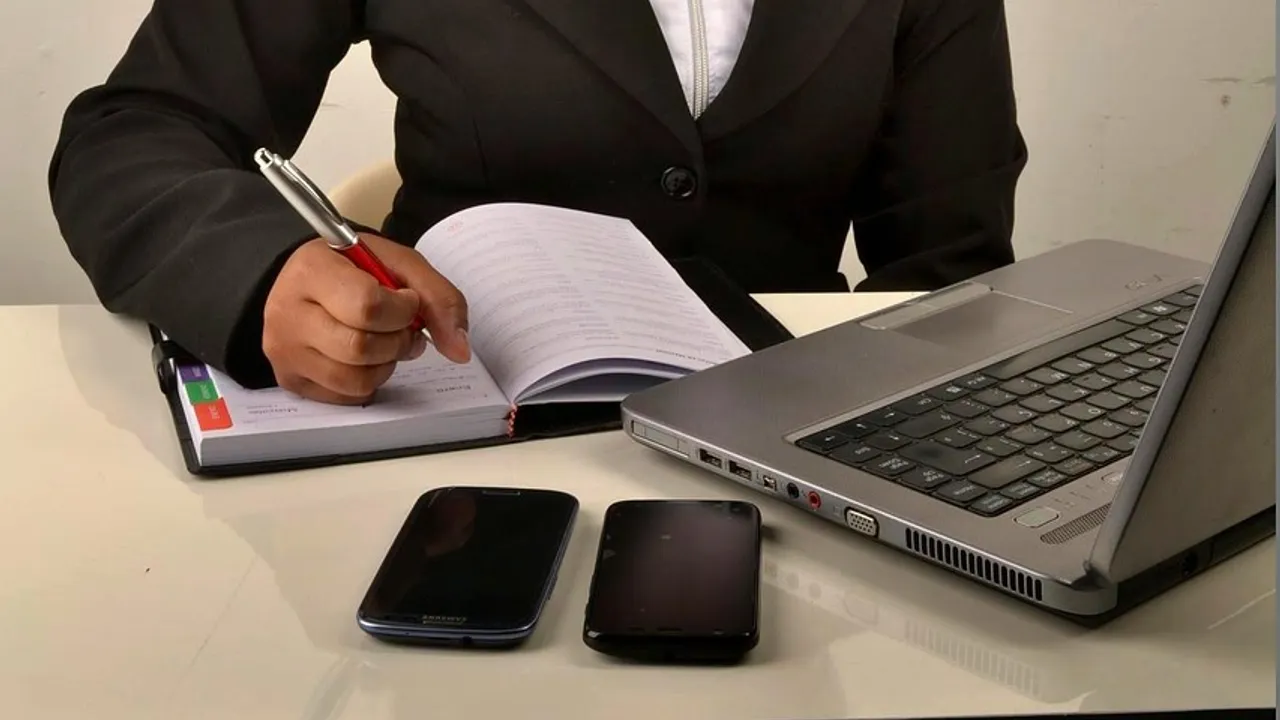 A creative professional at a computer