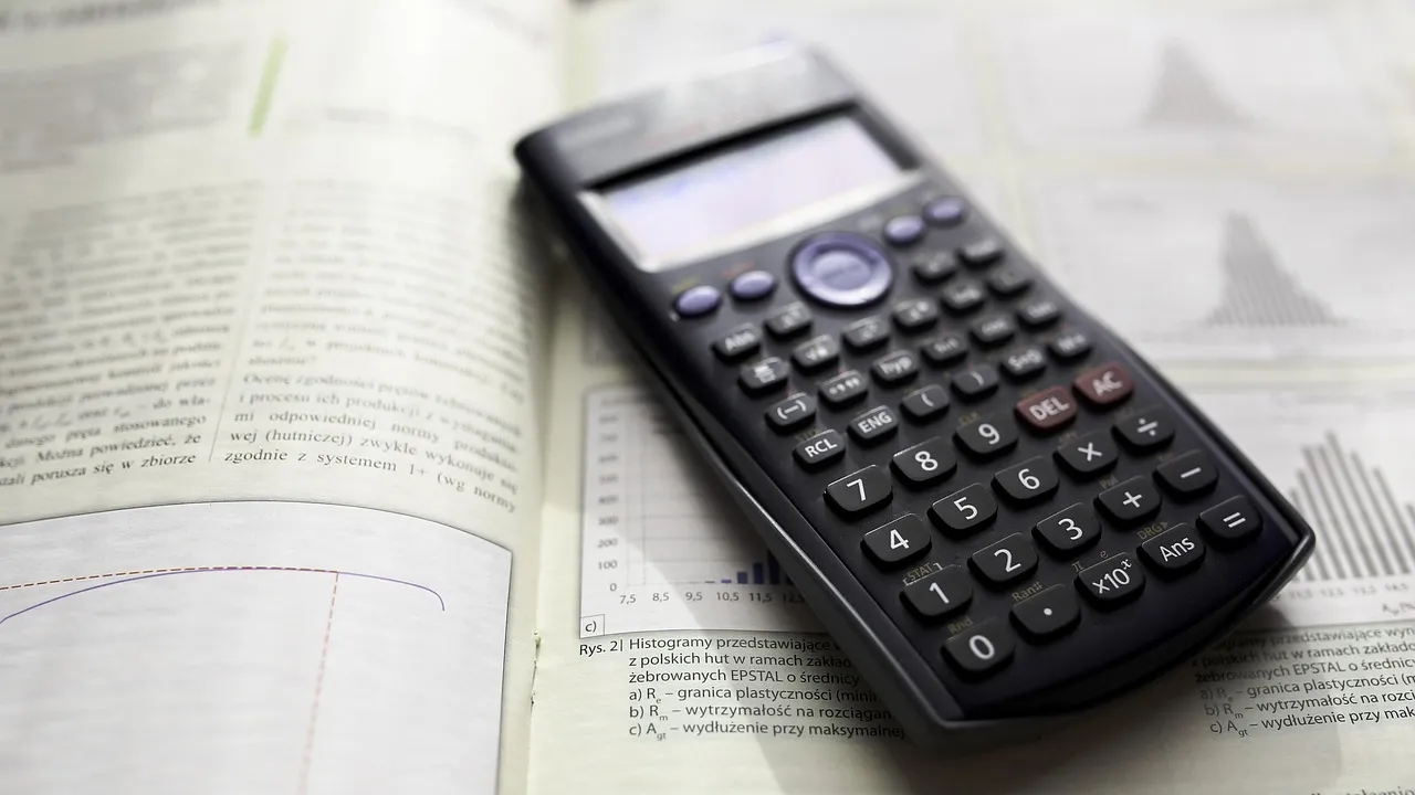 A calculator on retirement planning notes