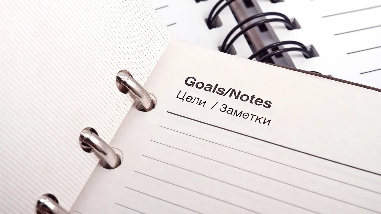 An open planning notebook on an office desk